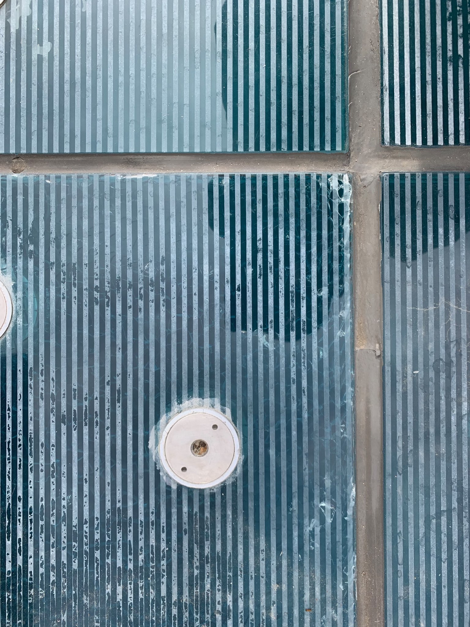 Glass Flooring with Worn Antislip Glass Close Up